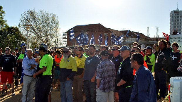 Construction, Forestry, Mining and Energy Union workers striking outside the Premier's new $17 million offices.