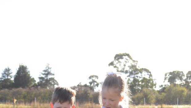 Sarah Page, environmental science and education teacher at St Francis Xavier Primary School in Ballarat East, with students Lily and Tim. 