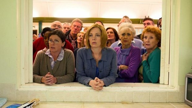 Olivia Colman (centre) with some of the residents in <i>London Road</i>.