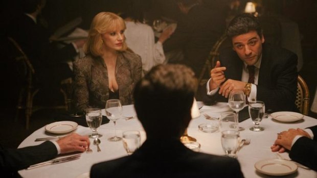 Oscar Isaac, right, and  Jessica Chastain play a couple struggling to run a heating oil firm in a corrupt New York in <i>A Most Violent Year</i>.