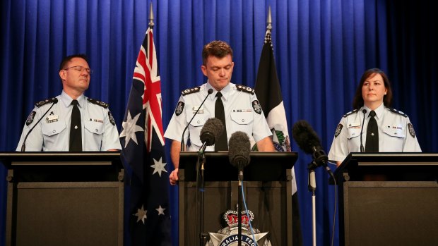 AFP Commissioner Andrew Colvin (centre), Deputy Commissioner Mike Phelan (left) and Deputy Commissioner Leanne Close (right).
