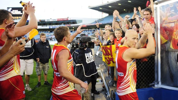 Gold Coast Suns celebrate.