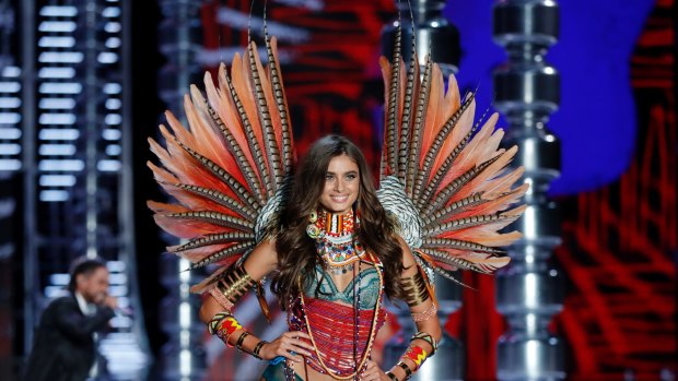 Model Taylor Hill wears a creation during the Victoria's Secret fashion show at the Mercedes-Benz Arena in Shanghai.