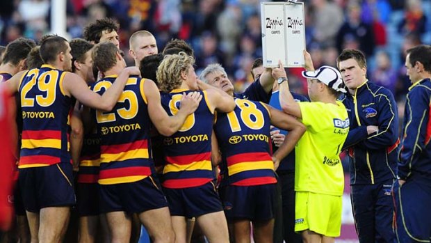 Getting the message: Neil Craig calls on his Crows for a big last quarter. They answered with six goals and a 57-point win.