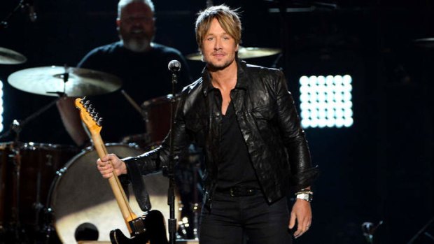 Singer/songwriter Keith Urban performs onstage during the 49th Annual Academy Of Country Music Awards.