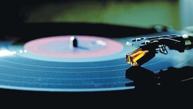 Vinyl sales jumped by more than half over the past year as it's embraced again by music lovers and collectors.