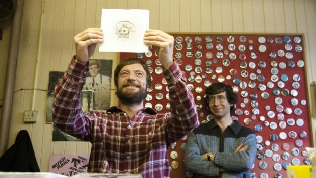 Handiwork: Richard Dormer eyes the vinyl in Good Vibrations.