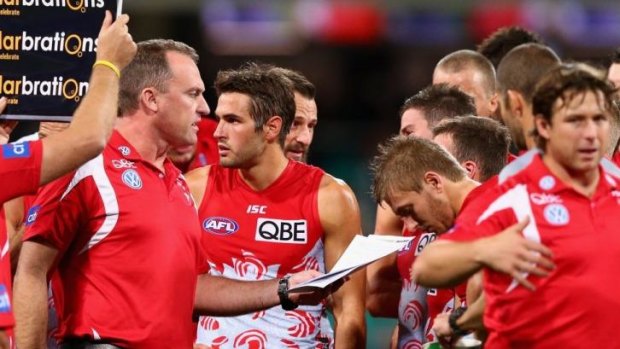 John Longmire addresses his players at the weekend.