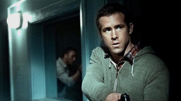 House of horrors ... Ryan Reynolds ''sweats, frets and jumps around'' as CIA agent Matt Weston.