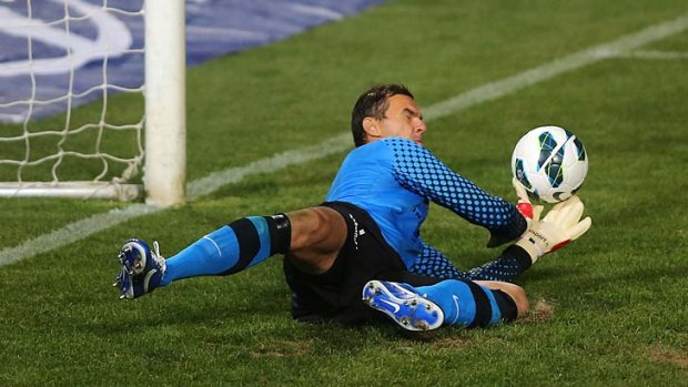 Safe hands &#8230; Ante Covic saves a penalty against Adelaide.