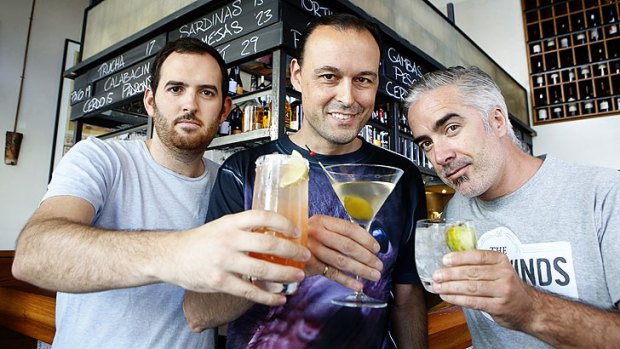 From left: James Sherry (Tequila Tromba), Dean Lucas (666 Vodka) and Jeremy Spencer (The West Winds Gin) toast their collective health.