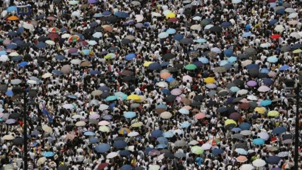 The annual July 1 rally, marking the day the territory returned to China, was tipped to draw the largest crowd since 2003, when half a million people turned out. 