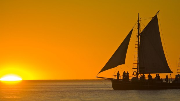 Pearl lugger at sunset off Cable Beach, Broome.