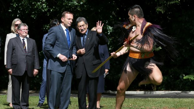 Tony Abbott is welcomed at Government House in Auckland on Friday. 