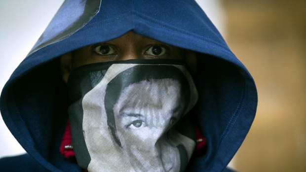 A man becomes a 'hoodie' for the One Thousand Hoodies March for Trayvon Martin. 'If I had a son, he'd look like Trayvon,' said President Obama.