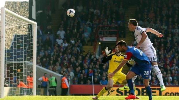 Chelsea skipper John Terry heads in an own goal that gave Crystal Palace a shock win in the Premier League.