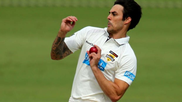 Mitchell Johnson of the Warriors bowls during day one of the Sheffield Shield match.