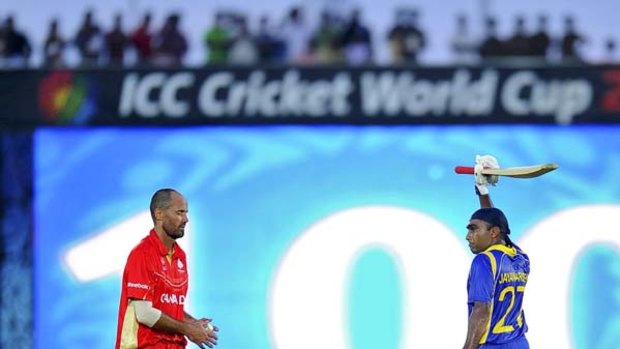 Mahela Jayawardene acknowledges the crowd after scoring his century.