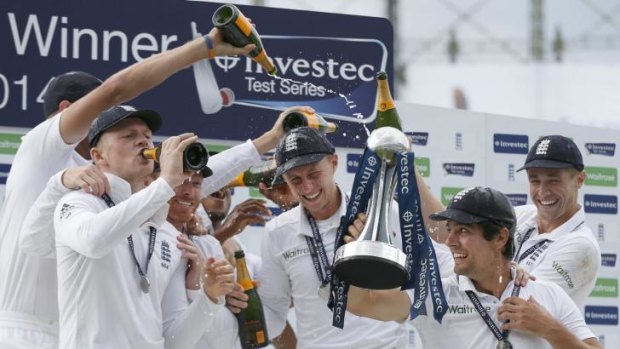 The England cricket team celebrate their 3-1 series win with champagne.