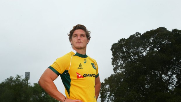 SYDNEY, AUSTRALIA - JUNE 11:  Michael Hooper poses for a picture with a Wallabies jersey after signing a new contract with Australian Rugby union during Waratahs training in Moore Park on June 11, 2015 in Sydney, Australia.  (Photo by Daniel Munoz/Fairfax Media)