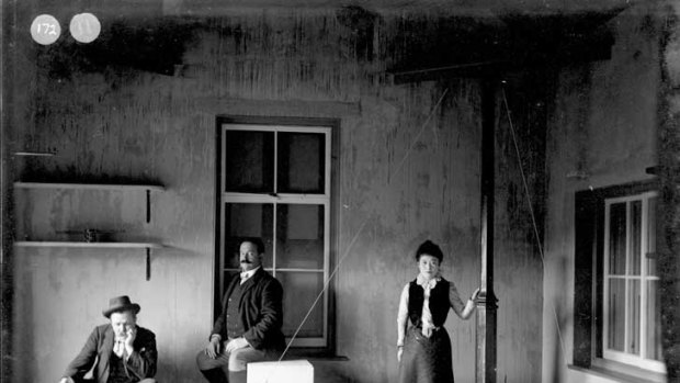John Milne with Russian seismologist Prince Boris Galitzin and his wife Tone Harikawa looking at one of his seismographs on the Isle of Wight in 1911.