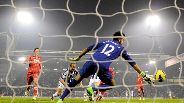 Peter Odemwingie of West Bromwich Albion scores his team's second goal.
