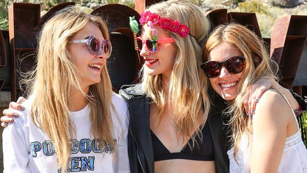 Model Cara Delevingne, model Poppy Delevingne and actress Sienna Miller attend the Superdry Coachella brunch hosted by Poppy Delevingne on April 12, 2014 in Palm Springs, California.