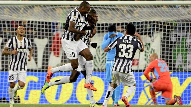 Goal: Juventus midfielder Paul Pogba celebrates with teammates after scoring against Napoli.