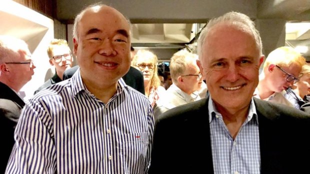 Malcolm Turnbull, here with WA MP Ian Goodenough at a Perth hotel on Sunday, says GST reform needs to pass the pub test