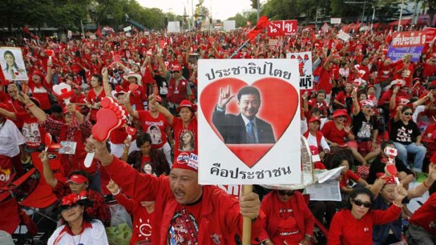 Analysts worry former Thai prime minister Thaksin Shinawatra's return home would spark a new wave of civil unrest among his red shirt supporters.