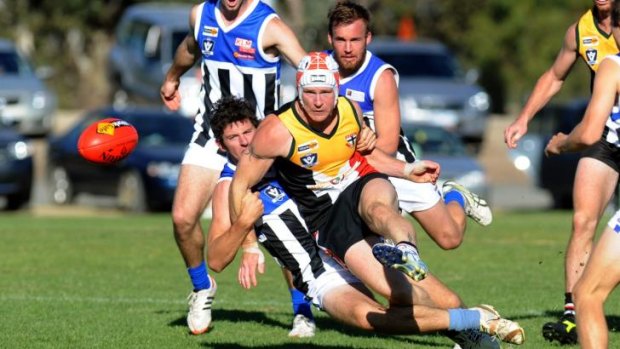 Against all odds: Phil Butsch in action for the Horsham Saints. 