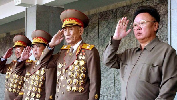 Dangerous times ... military leaders have reportedly been removed on the pretext of dishonouring the late Kim Jong-Il, right.