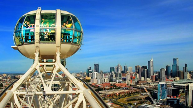 Up, up and away: People yesterday were able to take the first rides on Docklands' Southern Star Observation Wheel, Melbourne's answer to the London Eye.