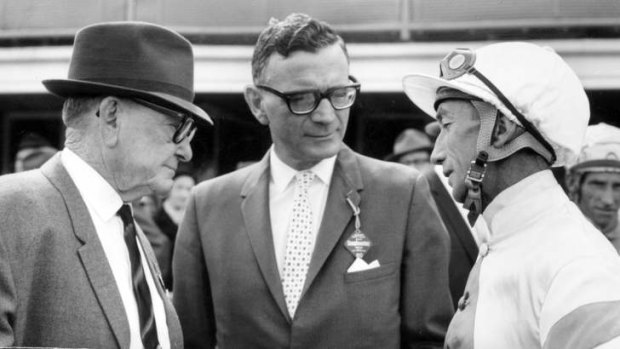 Trainer Harry Plant, vet Dr Percy Sykes and jockey George Moore at a race meeting at Canterbury in October 1973.