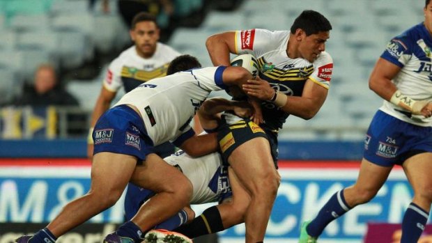 Giddy up: Jason Taumalolo carts the ball up for the Cowboys against Canterbury.