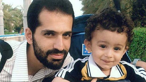 "Targeted killing" ... Iranian nuclear scientist, Mostafa Ahmadi Roshan, posing with his son.