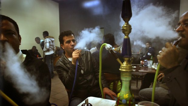 Patrons at a Sydney Road cafe argue that hookah smoking is a part of their cultural and social life.