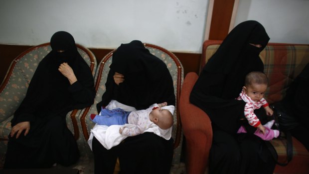 Uighur women and children in Istanbul in July, after fleeing from China where they say they were persecuted. 