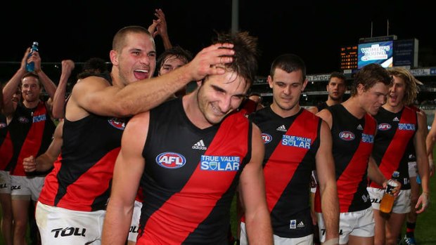 The Bombers celebrate after their round-14 victory over West Coast.