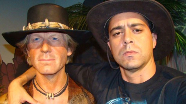Enjoying his time in Australia: Lucio Stein Rodrigues poses with a wax model of Crocodile Dundee.