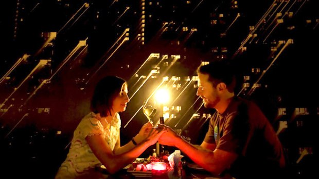Cherie Wilson and Andy Hill enjoy a candlelight dinner at Veludo restaurant in St Kilda. The restaurant turned the lights off as part of Earth Hour.