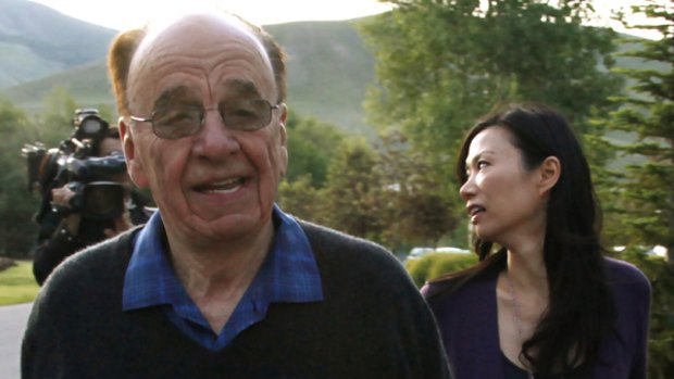 Rupert Murdoch, chairman and CEO of News Corporation, arrives with his wife Wendi in Sun Valley, Idaho in July.