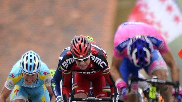 Cadel Evans chases stage winner Damiano Cunego in the Tour de Romandie.