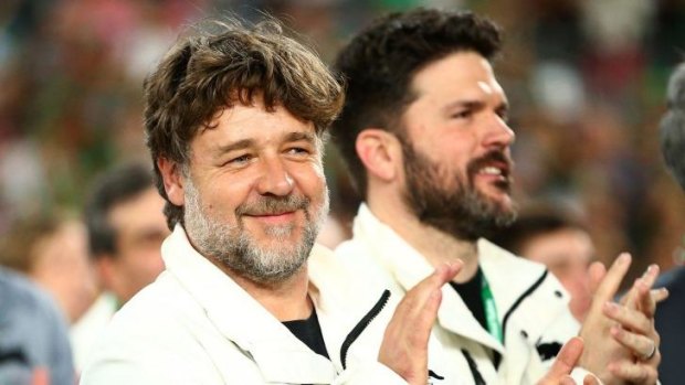 Russell Crowe celebrates grand final glory on Sunday.