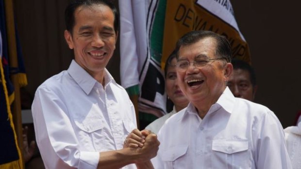 Joko Widodo, left,  and his running mate, Jusuf Kalla.