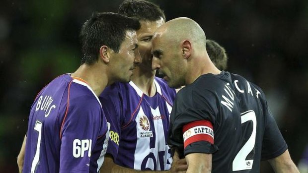Kevin Muscat (right) argues with Jacob Burns of the Glory argue during a match in 2010.