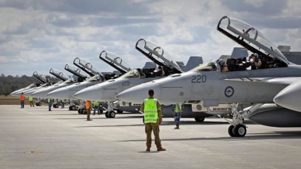 We're back: Australian F/A-18F Super Hornets prepare to depart to the Middle East.