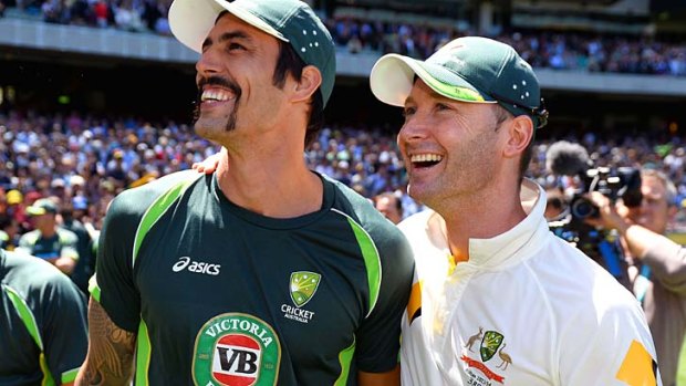 Winners are grinners: Mitchell Johnson and Michael Clarke after the MCG win.