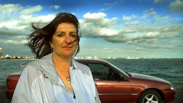 Wendy Pierce with the car her husband Victor was in when he was gunned down in Bay St Port Melbourne. Mrs Pearce now drives the car .