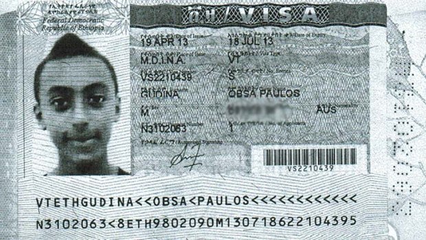 Obsa's visa in his passport.